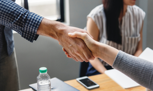 Two people shaking hands