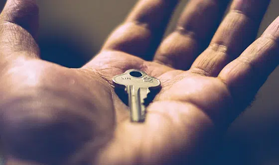 Person holding a key