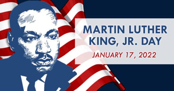 Martin Luther King in front of flag with box noting MLK Day on 1/17/22